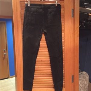 Joe’s snake pattern black jeans.